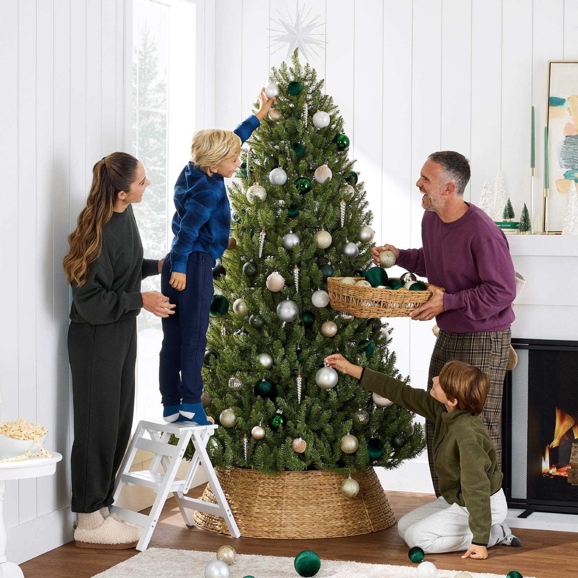 Premium Artificial Nordic Fir Hinged Christmas Tree with Foldable Metal Base for indoor and outdoor holiday displays