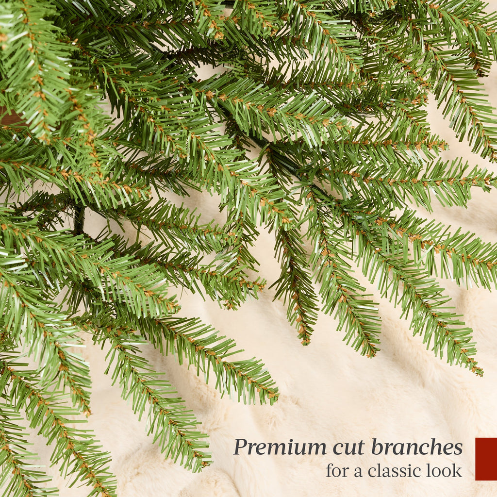 Premium Artificial Nordic Fir Hinged Christmas Tree with Foldable Metal Base for indoor and outdoor holiday displays